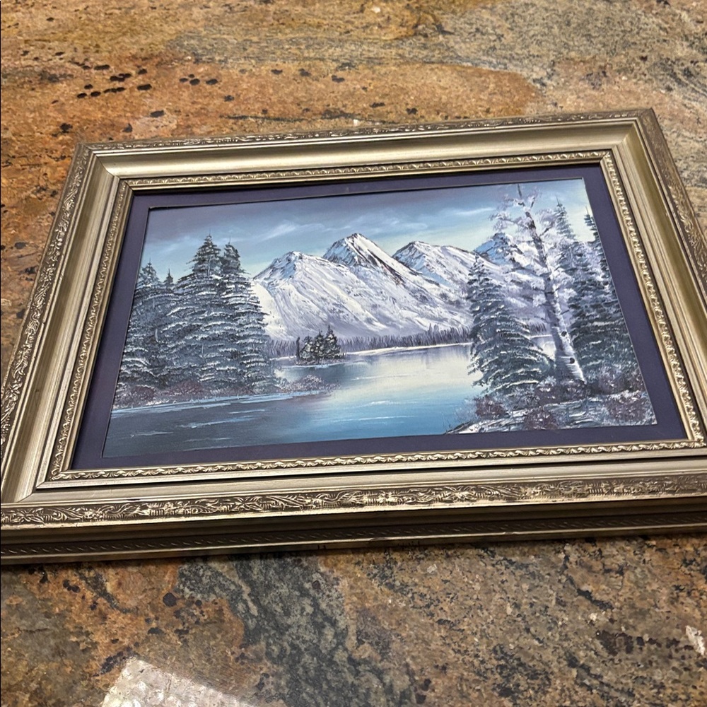 Oil painting of mountains, lake and trees